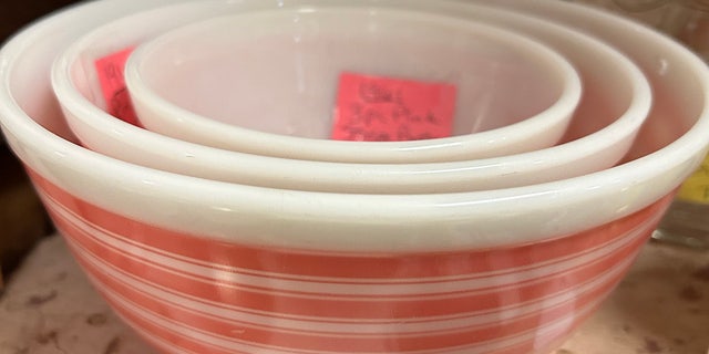This set of pink-and-white striped Pyrex nesting bowls is currently going for $329 at Cedar Chest, an antique mall in McGregor, Texas. Pink Pyrex has grown in popularity and value thanks to the TV series, "The Marvelous Mrs. Maisel."