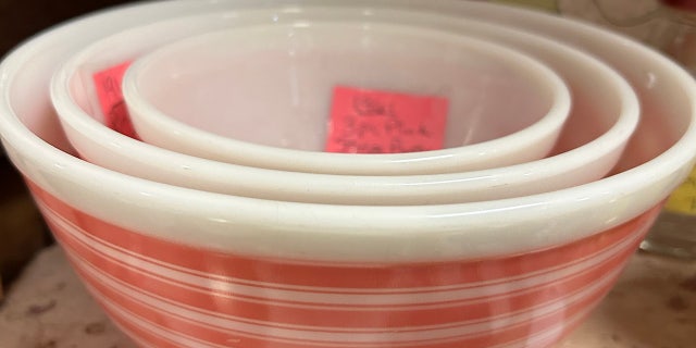 This set of pink-and-white striped Pyrex nesting bowls is currently going for $329 at Cedar Chest, an antique mall in McGregor, Texas. Pink Pyrex has grown in popularity and value thanks to the TV series, "The Marvelous Mrs. Maisel."