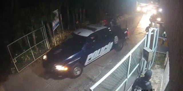 This screenshot of a security video provided by Vulcan Materials shows Mexican police and military entering the company's facility in Quintana Roo, Mexico, on March 14, 2023.