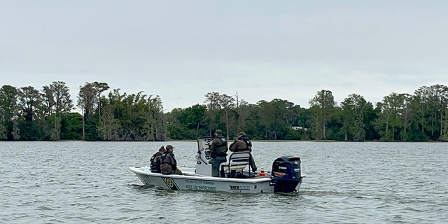 The two men are believed to have drowned in the choppy waters of Lake Eloise.