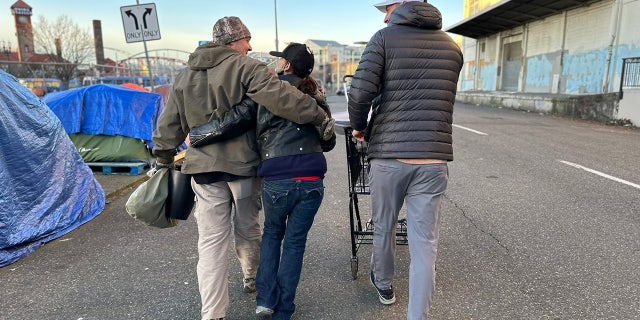 Wendy, center, walks with her family in Portland, Oregon.