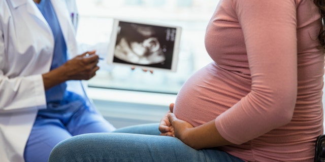 Pregnant woman at the doctor