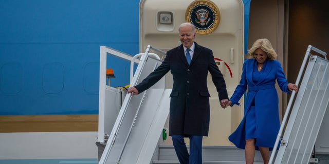 President Joe Biden walks down the stairs of Air Force One with first lady Jill Biden after arriving in Canada to meet with Prime Minister Justin Trudeau.