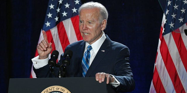 President Biden gives the keynote address on the first night of "People Over Politics" House Democrats 2023 Issues Conference at the Hyatt Baltimore Inner Harbor in Baltimore on Wednesday.