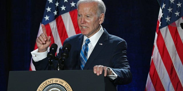 President Biden gives the keynote address on the first night of "People Over Politics" House Democrats 2023 Issues Conference at the Hyatt Baltimore Inner Harbor in Baltimore on Wednesday.