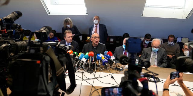 The President of the Spanish Episcopal Conference, Cardinal Juan Jose Omella, center, speaks during a press conference in Madrid, Spain, on Feb. 22, 2022. Spain’s ombudsman said March 13, 2023, that an independent commission has collected testimonies from 445 victims.