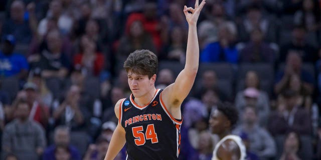 Princeton forward Zach Martini reacts after hitting a three-pointer during the first half of the team's second round game against Missouri in the NCAA Tournament in Sacramento, Calif., on Saturday, March 18, 2023. 