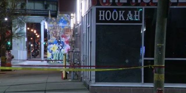 Investigation revealed that an interaction between a patron and security officer at a hookah lounge led to the shooting.