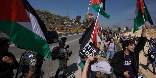 Israel Border Police officers prevent hundreds of Israeli leftist activists from organizing a solidarity rally March 3, 2023, in a Palestinian town that was set on fire by radical Jewish settlers on Sunday.