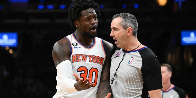 Julius Randle of the New York Knicks bumps into referee Brett Nansel, drawing a technical foul during the third quarter of a game against the Boston Celtics at the TD Garden March 5, 2023, in Boston.