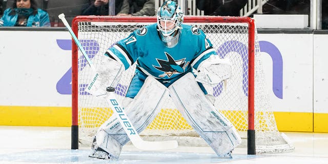 James Reimer of the San Jose Sharks takes reps during warmups at SAP Center March 11, 2023, in San Jose, Calif.
