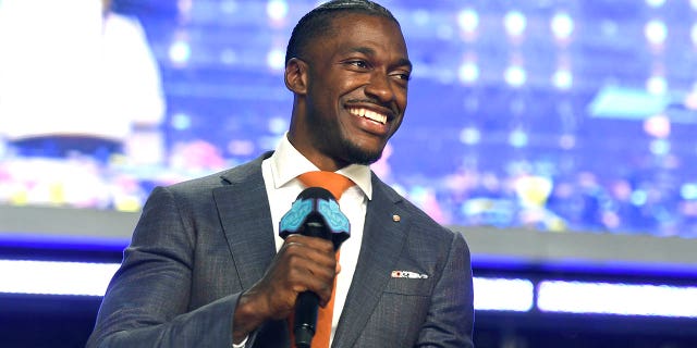 Robert Griffin III speaks onstage during round four of the 2022 NFL Draft on April 30, 2022, in Las Vegas, Nevada. (Photo by David Becker/Getty Images)