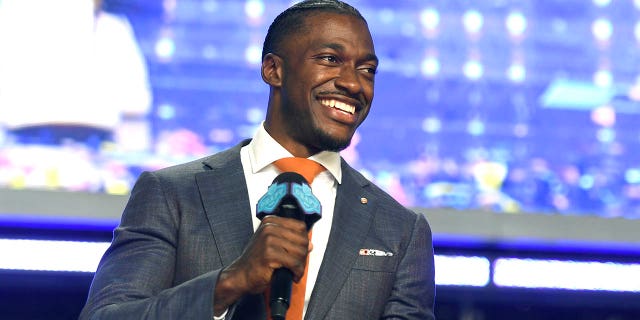 Robert Griffin III performs on stage during the fourth round of the 2022 NFL Draft on April 30, 2022 in Las Vegas, Nevada. (Photo by David Becker/Getty Images)