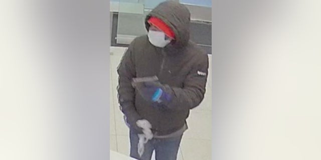 An image of a suspect bank robbery who shot a security guard Thursday. 