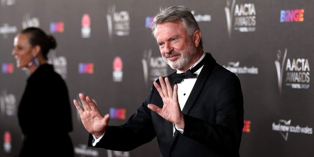Sam Neill reassured fans Saturday he's "alive and well." 