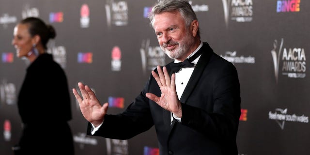 Sam Neill reassured fans Saturday he's "alive and well."