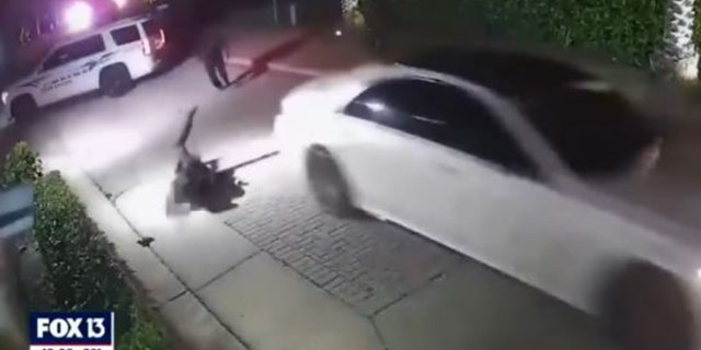 The moment after a Sarasota police officer was hit by a suspect vehicle the night of March 20, 2023.