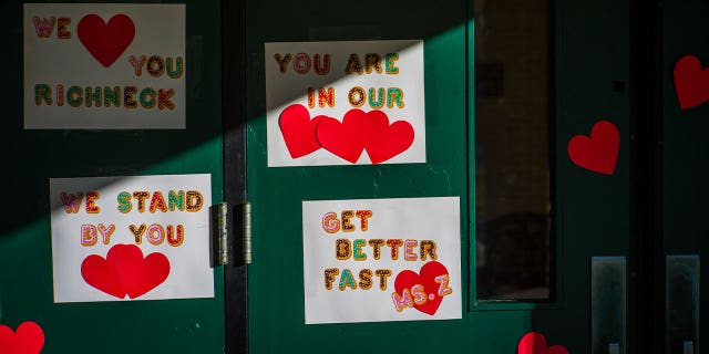 Messages of support for teacher Abby Zwerner, who was shot by a 6-year-old student, are posted on the front door of Richneck Elementary School in Newport News, Virginia, on Jan. 9, 2023. 