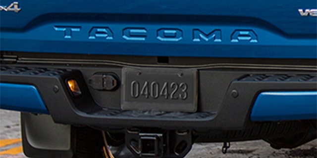 The Tacoma's plate indicates the truck's reveal will be on April 4.