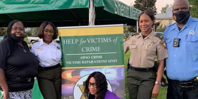 Tamara Jackson, left, considers herself a liason between law enforcement and victims' families in New Orleans.