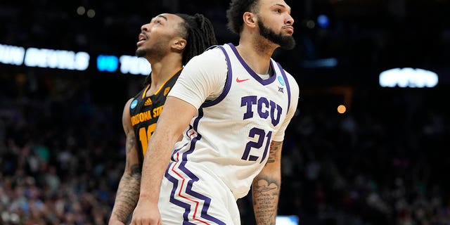 TCU forward JaKobe Coles, front, reacts after hitting the go-ahead basket, next to Arizona State guard Frankie Collins in a first-round college basketball game in the men's NCAA Tournament on Friday, March 17, 2023, in Denver. 