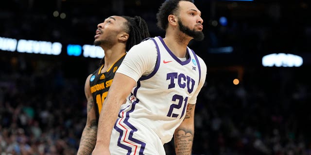 TCU forward JaKobe Coles, front, reacts after hitting the go-ahead basket, next to Arizona State guard Frankie Collins in a first-round college basketball game in the men's NCAA Tournament on Friday, March 17, 2023, in Denver. 