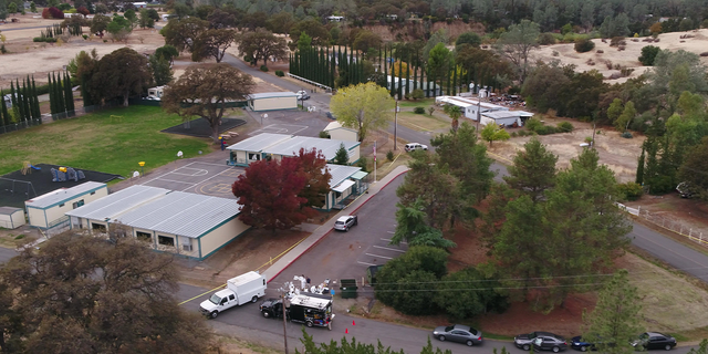 FBI investigators, foreground center, gather evidence at the Rancho Tehama Elementary School in Rancho Tehama Reserve in Corning, California, on Tuesday, Nov.14, 2017.