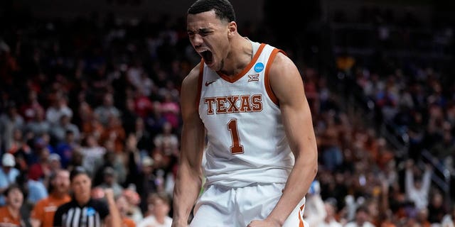 Texas forward Dylan Disu celebrates after making a basket in the second half of a first-round college basketball game against Colgate in the NCAA Tournament, Thursday, March 16, 2023, in Des Moines, Iowa.