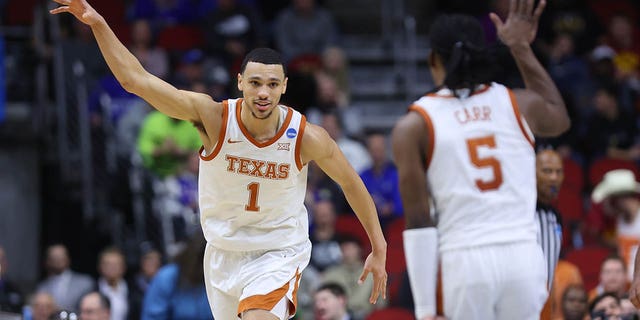 Dylan Disu #1 of the Texas Longhorns reacts after a made basket against the Penn State Nittany Lions during the second half in the second round of the NCAA Men's Basketball Tournament at Wells Fargo Arena on March 18, 2023, in Des Moines, Iowa. 