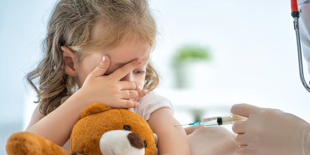 Toddler getting vaccine