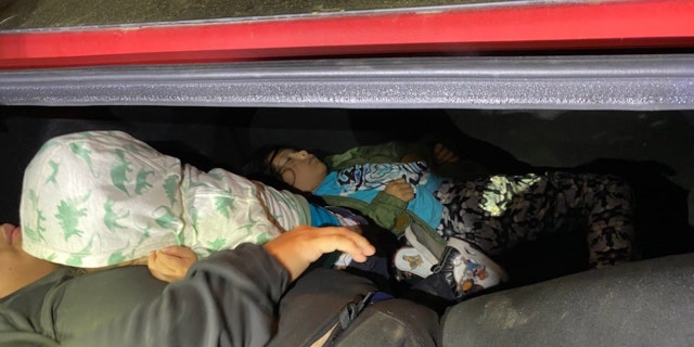 A mother and two children, ages 7 and 2, were found in the trunk of a vehicle being smuggled into the United States on March 14, 2023. 