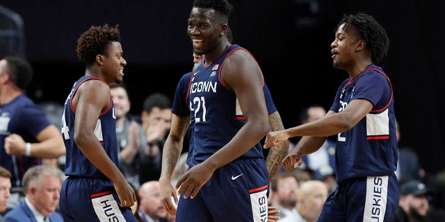 Adama Sanogo #21 of the Connecticut Huskies reacts during the second half against the Gonzaga Bulldogs in the Elite Eight round of the NCAA Men's Basketball Tournament at T-Mobile Arena on March 25, 2023 in Las Vegas, Nevada. 