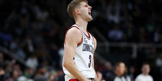 Joey Calcaterra of the Connecticut Huskies reacts in the first half against the Iona Gaels in the first round of the NCAA Tournament at MVP Arena on March 17, 2023 in Albany, NY
