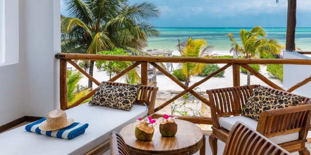 Above, a home on the beach on Zanzibar island. In a social media post, a woman on Reddit said she had always dreamed of a house on the beach — but said her late husband had been "tight-fisted" with money.