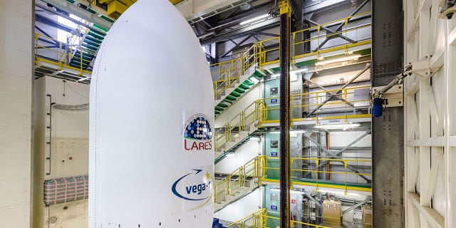 The Vega-C rocket is assembled to the launcher's nose cone at Kourou, French Guiana, on July 12, 2022.
