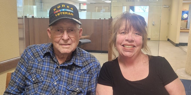 Veteran Floyd Barber of Tucson, along with his friend Sheri Acchia, made a trip to Chase Bank to deposit the money raised by the community after he was robbed on March 8. 