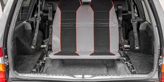 A set of rear-facing jump seats turns the car into a seven-passenger vehicle.