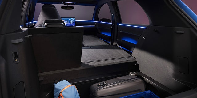 The ID.2all's front passenger seat folds flat for cargo carrying.