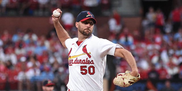 Adam Wainwright #50 of the St. Louis Cardinals pitches against the Atlanta Braves in the first inning at Busch Stadium on August 28, 2022 in St Louis, Missouri.