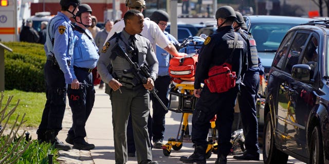 First responders in Pittsburgh at the site of a crank call by Ashton Garcia, who was arrested in Washington state Thursday.