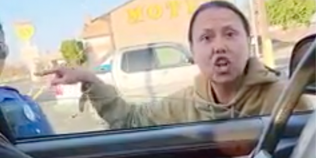 Owner of Washington dispensary The Green Seed yells at trooper.