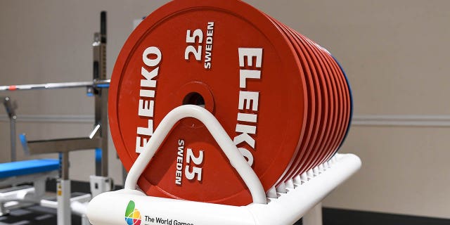 A stack of weights in the warm-up room in the men's middleweight powerlifting event at the 2022 World Games July 9, 2022, at the Birmingham-Jefferson Convention Complex Concert Hall in Birmingham, Ala. 