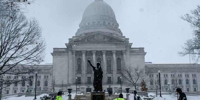 The Wisconsin State Capitol is pictured in Madison, Wisconsin, on Feb. 9, 2023. Gov. Tony Evers wants to sell three state office buildings around the Capitol in an effort to reduce the government's footprint in Madison.