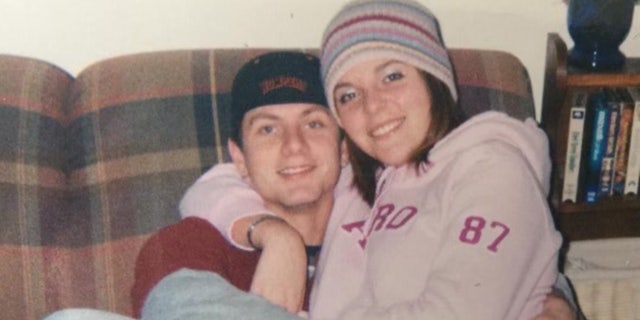 Tiffany Eckert and her late husband, Andy Eckert, snuggle in 2003 before his deployment.