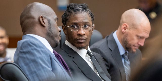 Young Thug, whose real name is Jeffery Williams, is seen at a hearing in Atlanta, Georgia, on Dec. 22, 2022. The judge overseeing the case has ordered an investigation after a video of an interview with a witness was posted online.