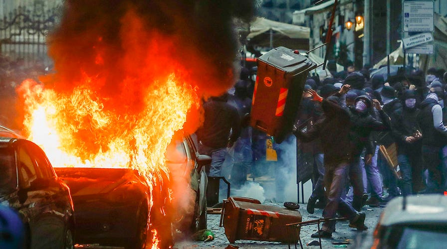 Italian authorities clash with soccer fans ahead of Champions League match