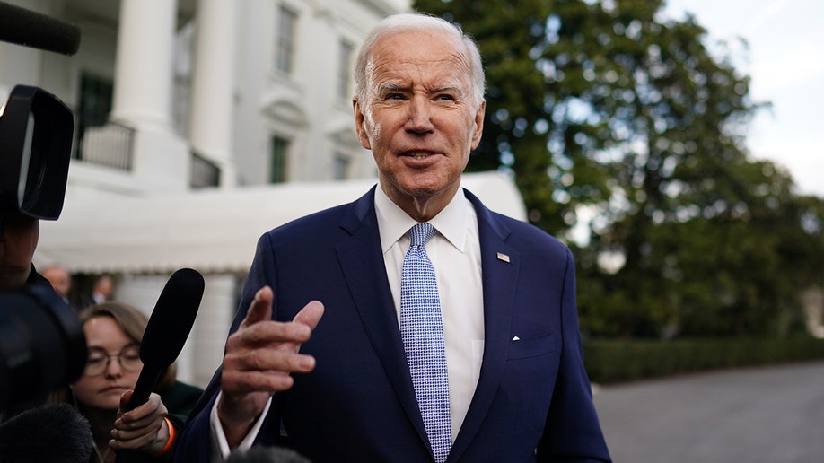 President Biden by reporters