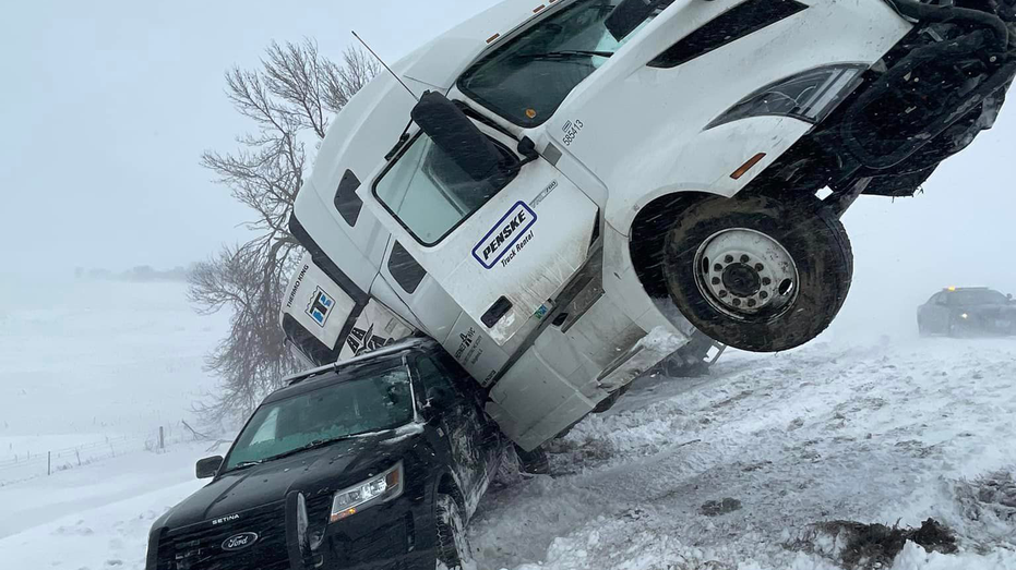 South Dakota trooper’s cruiser hit by sliding semi during winter storm