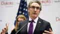 FILE - North Dakota Gov. Doug Burgum speaks at the state Capitol on April 10, 2020, in Bismarck, N.D. Burgum on Monday approved a bill allowing teachers and state employees to ignore transgender students and colleagues' preferred pronouns without legal scrutiny.