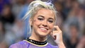 Apr 15, 2023; Fort Worth, TX, USA; LSU Tigers gymnast Olivia Dunne warms up with her team on floor during the NCAA Women's National Gymnastics Tournament Championship at Dickies Arena.